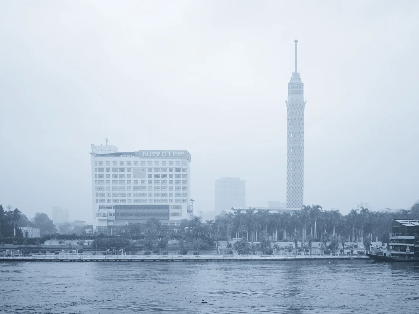 Cairo's illuminated skyline seen from the river